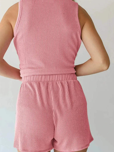 Round neck sleeveless pink top and shorts set with pocketed design.