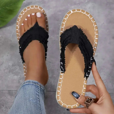 Toe Post Raw Hem Flat Sandals with canvas and rubber material.