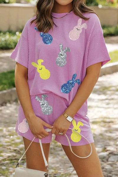 Ribbed sequined Easter bunny t-shirt and shorts set in pink with colorful bunny designs.