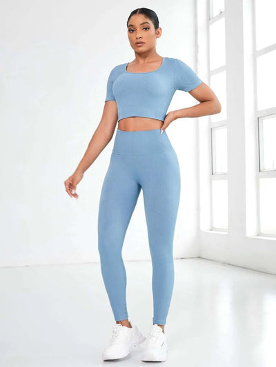 Round neck short sleeve top and leggings active set in blue, two-piece outfit.