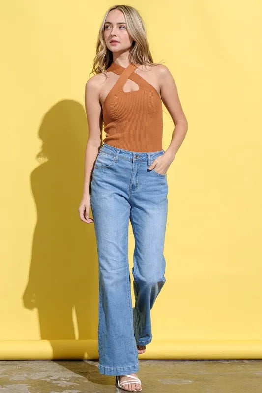Front view of the criss cross halter top showing ribbed texture and stylish neckline