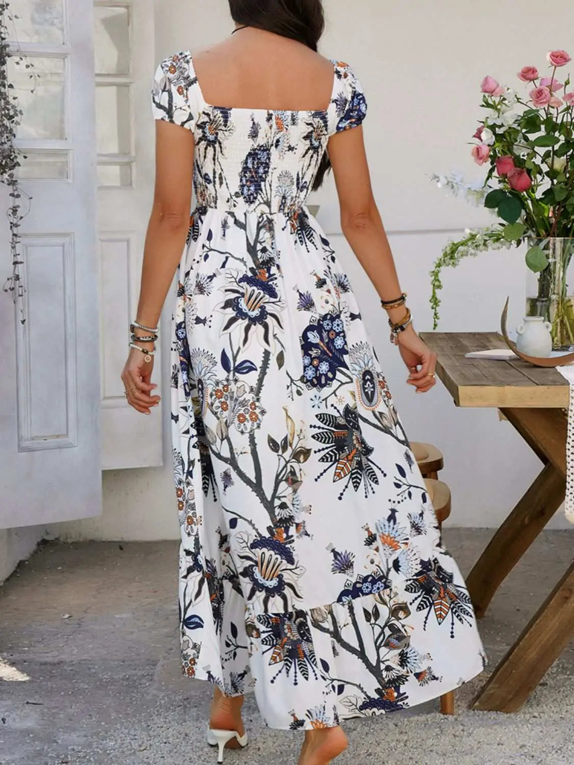 Devine Smocked Printed Short Sleeve Maxi Dress with floral pattern displayed on a model.