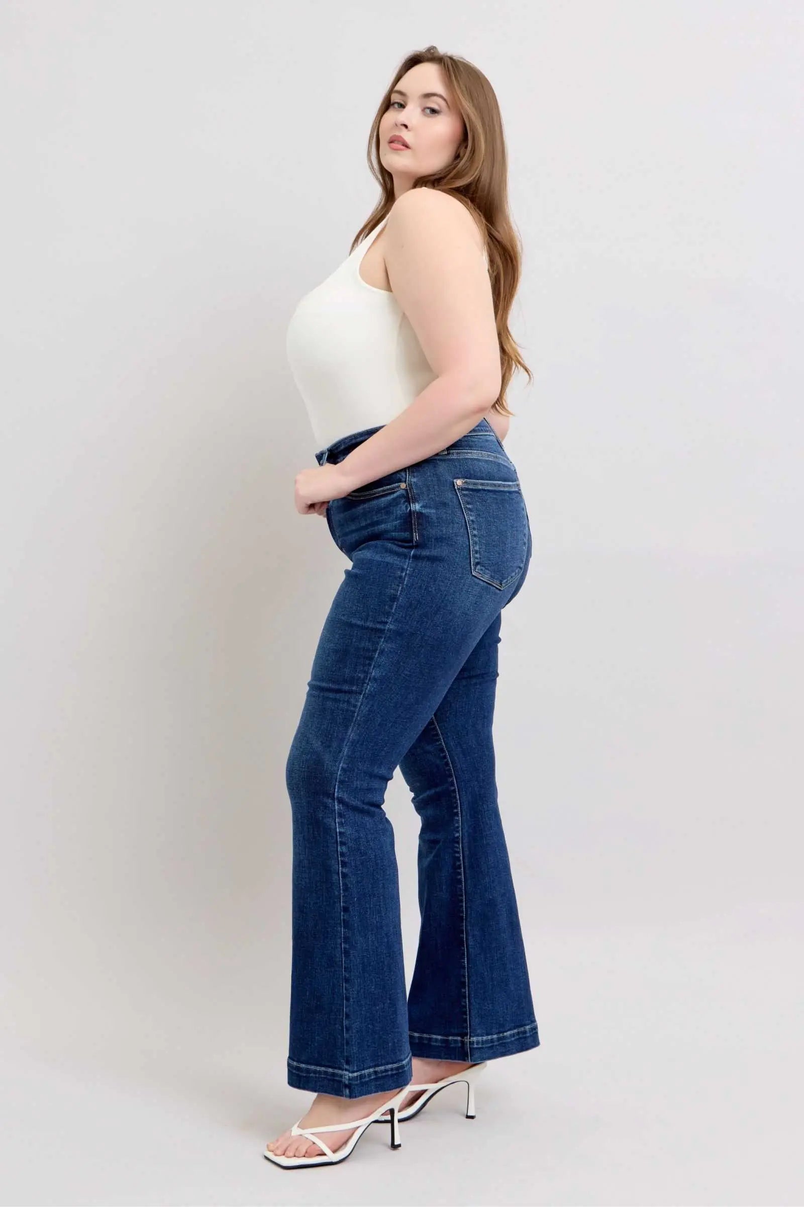 Judy Blue Full Size High Rise Flare Jeans Plus Size with Pockets, trendy and versatile wardrobe staple.
