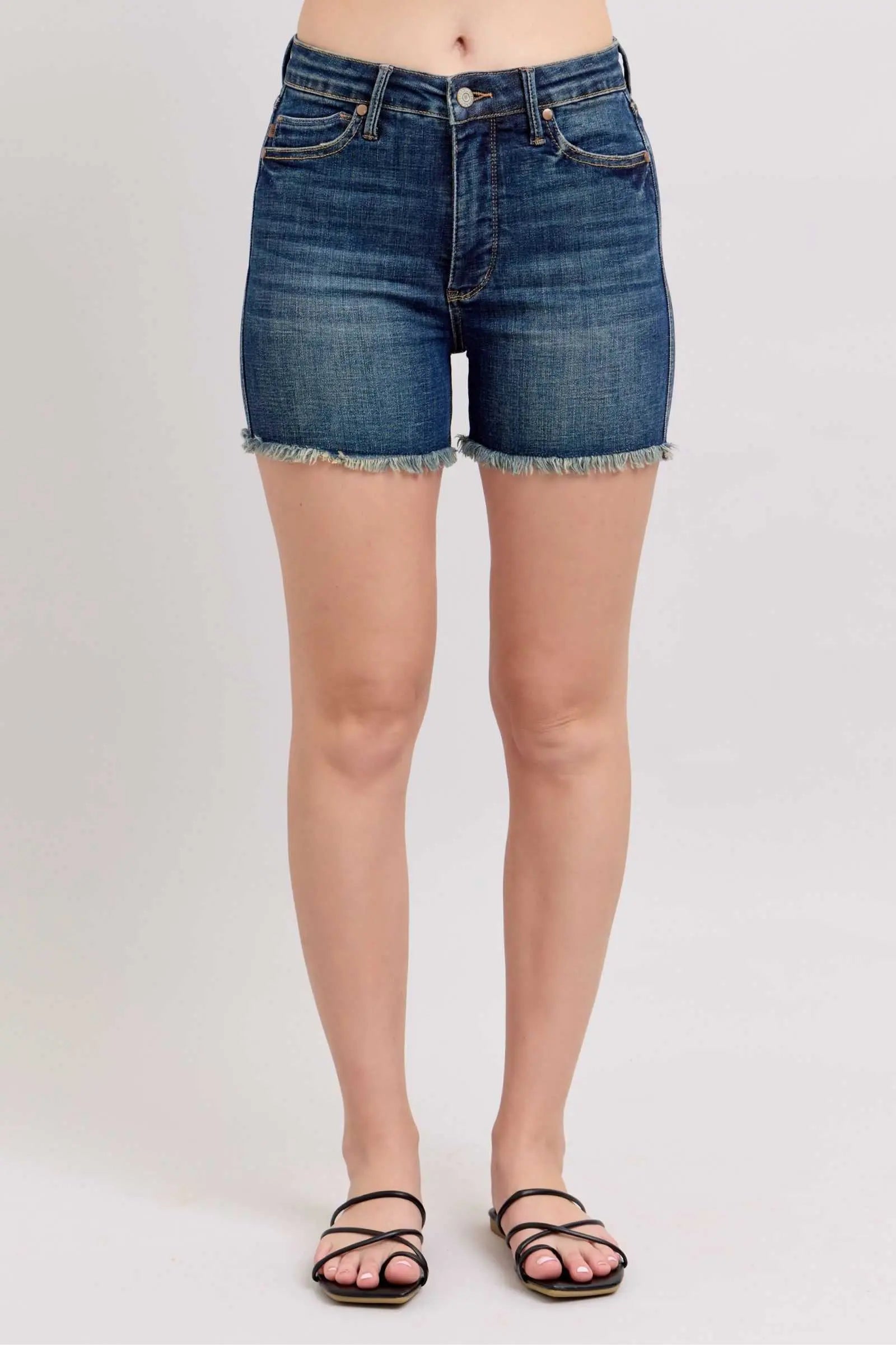 Judy Blue Tummy Control Denim Shorts with Fray Hem and Shield Back Pockets.