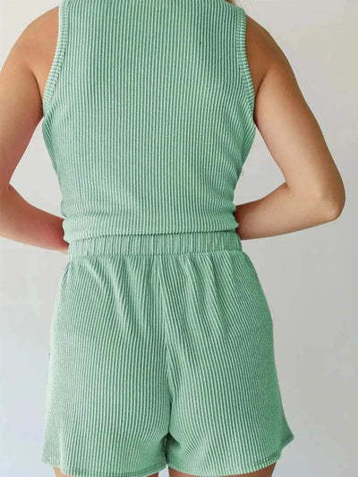 Round neck sleeveless top and shorts set in light green featuring ribbed texture.