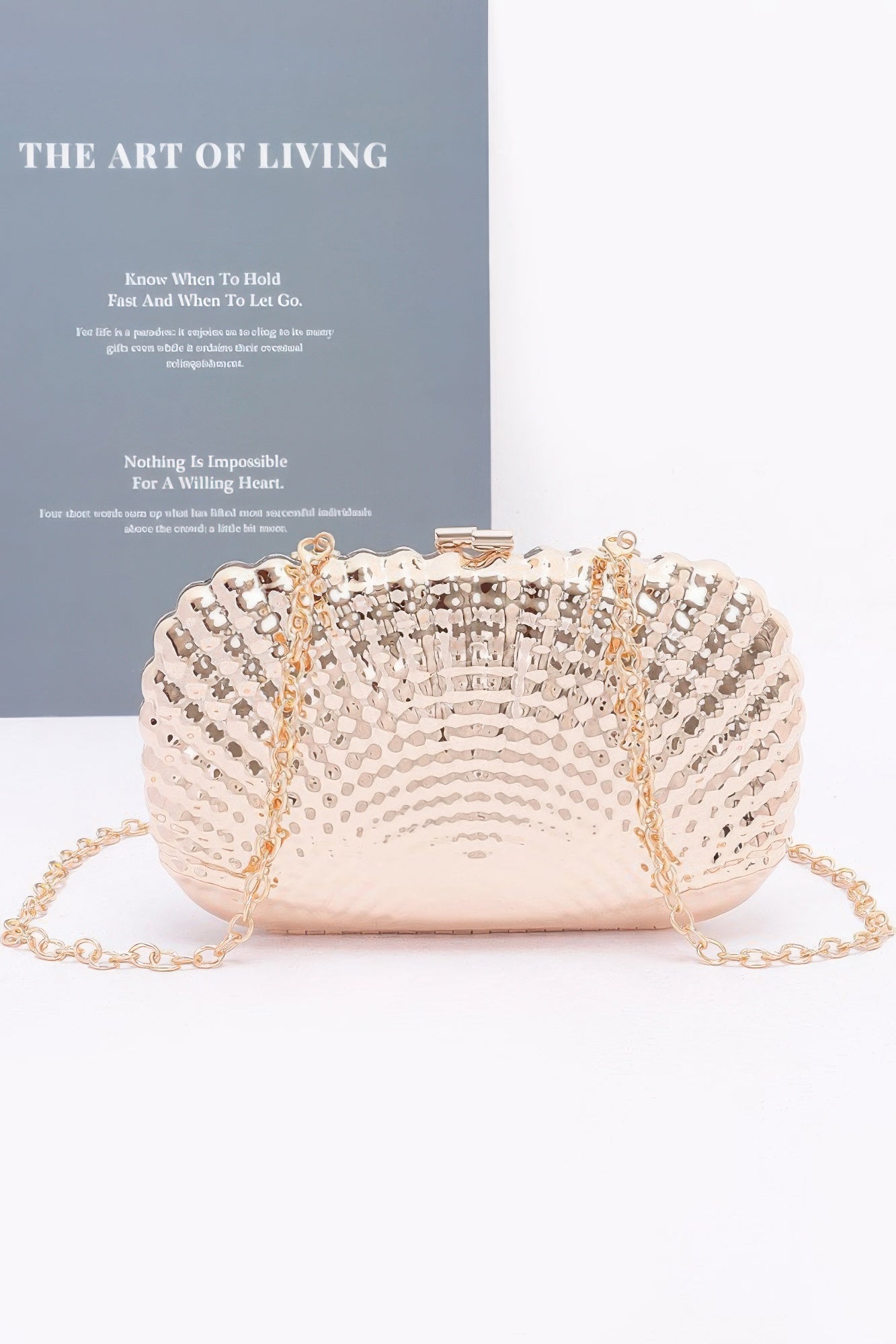  Front view of the Elegance Metallic Clutch – a luxury metal clutch for women