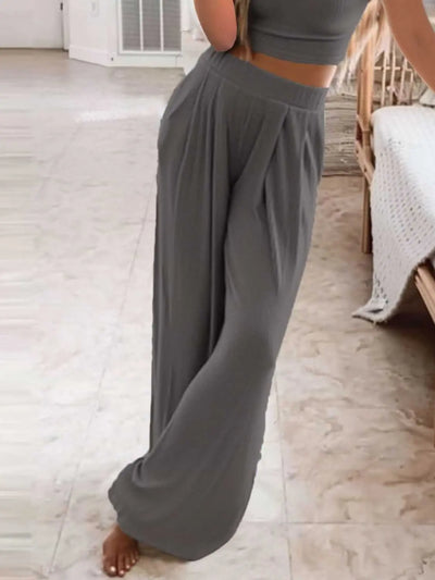 Plus size round neck short sleeve top and pants set in gray, slightly stretchy fabric.