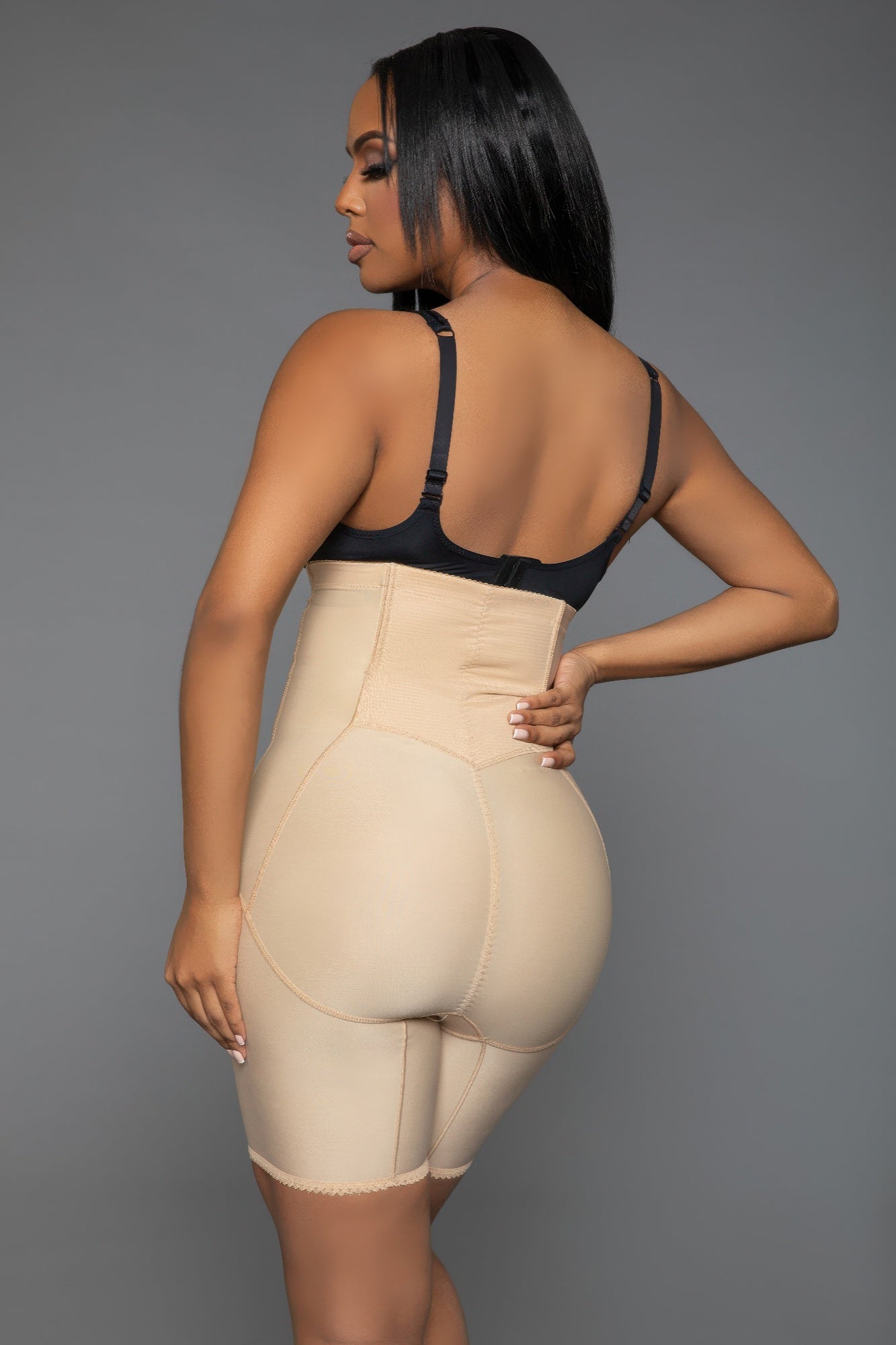 Back view of Feeling My Curves body shapewear bodysuit showing butt-lifting effect and smooth silhouette