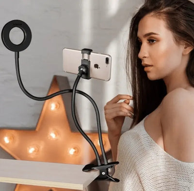 LED Selfie Ring Light with adjustable stand clamped on desk in use.
