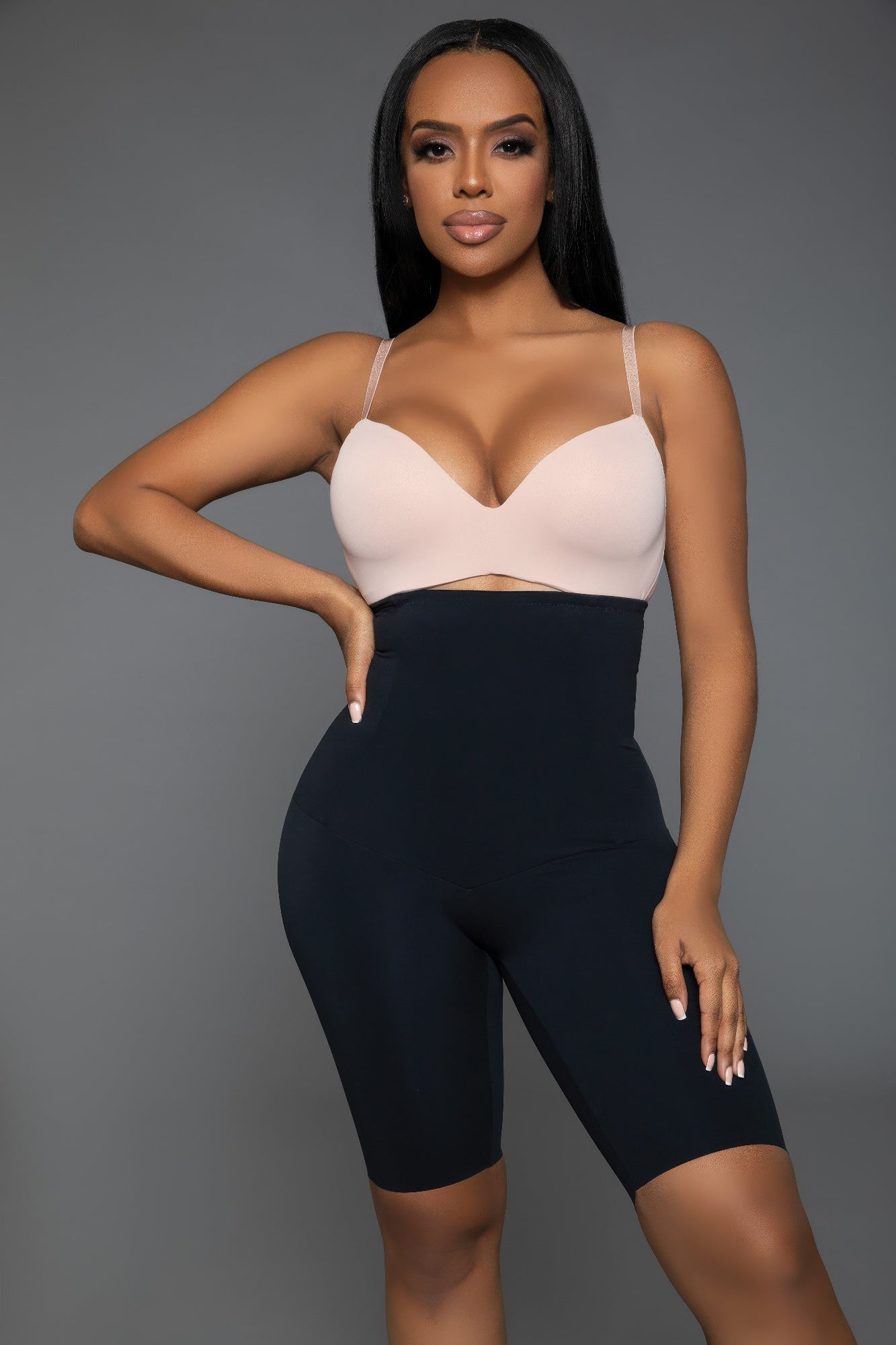 Farther front view of low back shapewear shorts highlighting seamless design