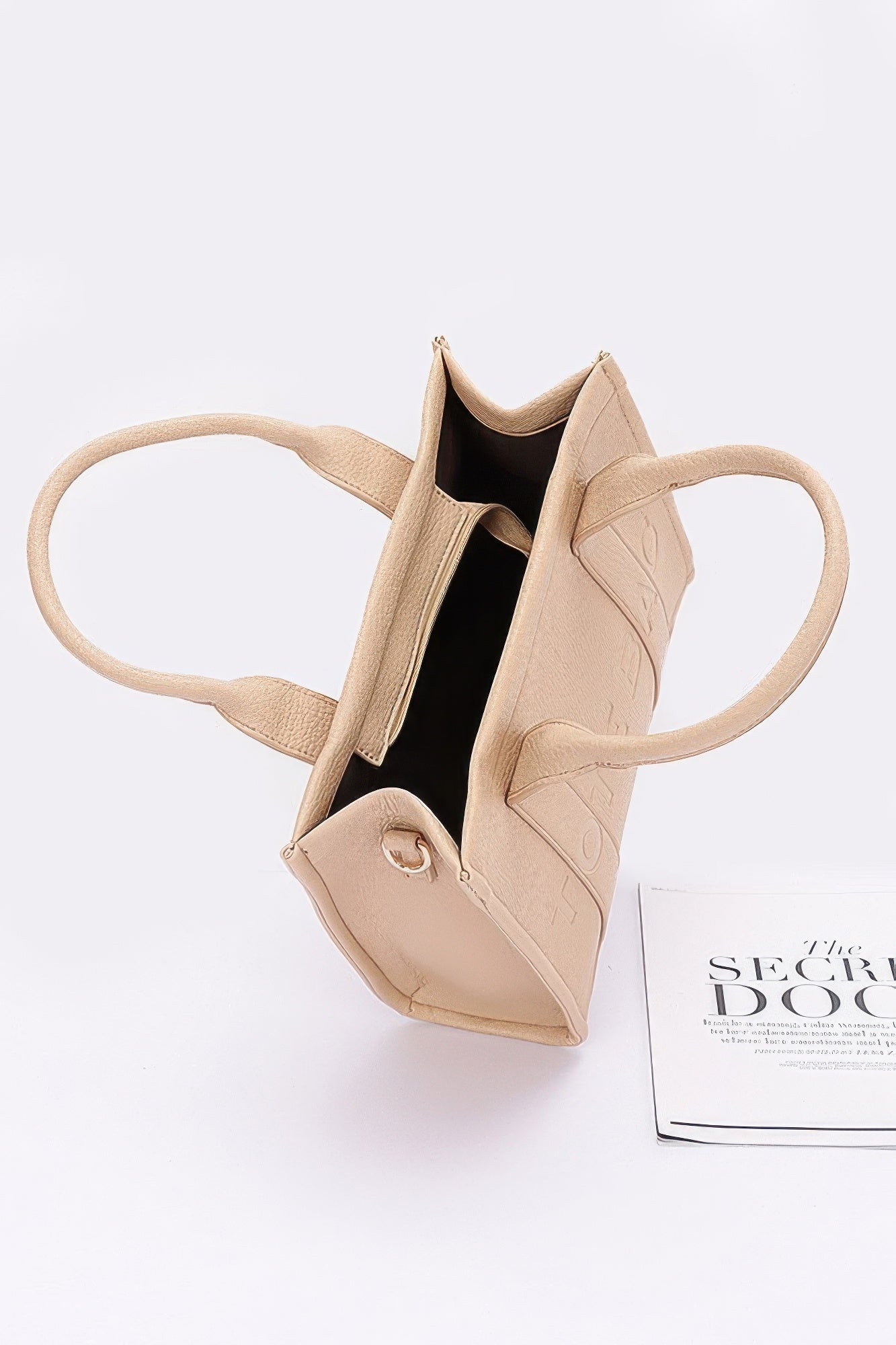Open interior of pink women's tote bag – faux leather tote design