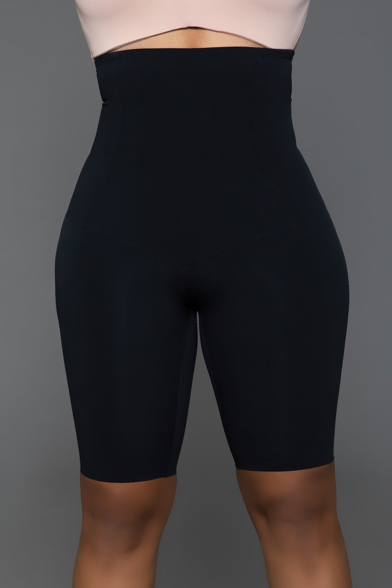 Larger front view of shapewear shorts showing tummy control and smooth fit